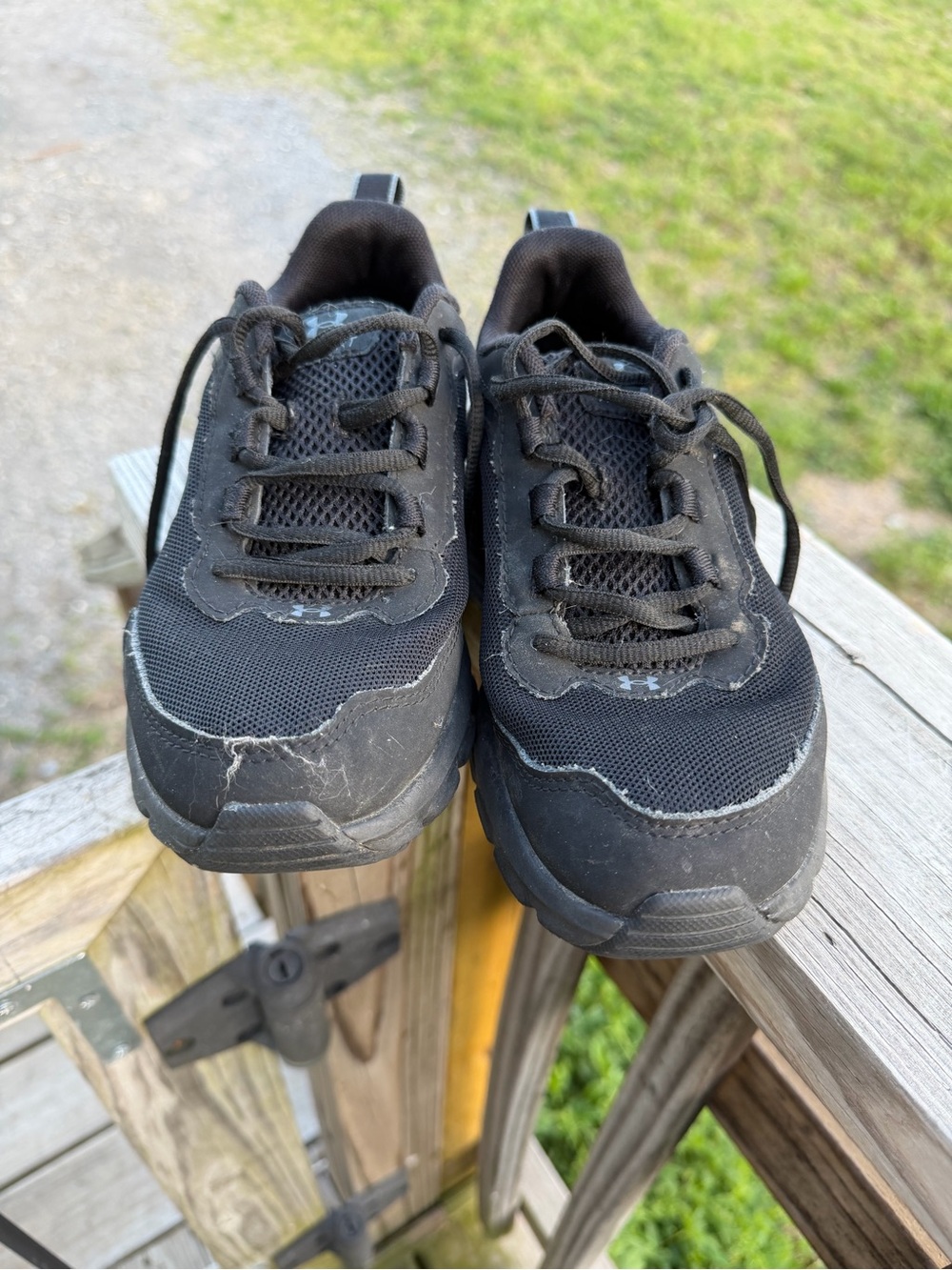 Youth size 4 gentle use Black Under Armor sneakers
